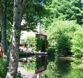 Moulin des Vaux cottage overlooking weir and river